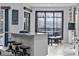 Cozy kitchen featuring a marble counter, and a breakfast nook with backyard pool views at 302 Hermits Trl, Altamonte Springs, FL 32701