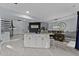 Open-concept kitchen features a modern design, large island and dining room at 302 Hermits Trl, Altamonte Springs, FL 32701
