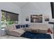 Cozy living room with comfortable furniture, a large window, and stylish decor at 302 Hermits Trl, Altamonte Springs, FL 32701