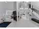 Open-concept living space with fireplace, stairs, and bright, neutral décor at 302 Hermits Trl, Altamonte Springs, FL 32701