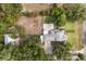 Bird's-eye view of a property featuring an outdoor firepit and extensive yard space at 32615 Windy Oak St, Sorrento, FL 32776