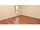 Bright bedroom boasts natural light, hard surface floors and neutral paint at 3441 Hickory Creek Rd, Deltona, FL 32738