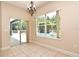 Dining room with backyard and pool view at 3441 Hickory Creek Rd, Deltona, FL 32738