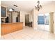 Open kitchen with breakfast bar and pool views at 3441 Hickory Creek Rd, Deltona, FL 32738