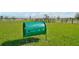 Dog park agility equipment with a tunnel for dogs to enjoy, set in a grassy, fenced area at 3586 Dahlia Dr, Lake Hamilton, FL 33851