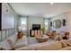 Cozy living room with modern decor, large sofa, and stylish accents at 3586 Dahlia Dr, Lake Hamilton, FL 33851