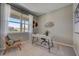 Well-lit home office featuring a large window, modern desk and chair, and neutral walls at 3586 Dahlia Dr, Lake Hamilton, FL 33851