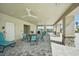Covered outdoor community space with seating, ceiling fans, and convenient access to restrooms and water fountains at 3586 Dahlia Dr, Lake Hamilton, FL 33851