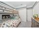 bedroom featuring a bunk bed, gray dresser, and closet for storage with dog-themed decorations at 3588 Dahlia Dr, Haines City, FL 33844