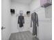 Walk-in closet featuring wire shelving and hanging rods for ample storage space at 3588 Dahlia Dr, Haines City, FL 33844