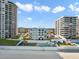 A serene aerial view showcases the beachfront condos, sparkling pool, and inviting gazebo at 3747 S Atlantic Ave # 2050, Daytona Beach, FL 32118