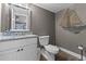 Bathroom with granite countertops, modern fixtures, and stylish decorations for a clean, refreshed space at 3747 S Atlantic Ave # 2050, Daytona Beach, FL 32118