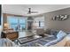 Cozy living room with stylish furniture and a stunning ocean view through sliding glass doors at 3747 S Atlantic Ave # 2050, Daytona Beach, FL 32118