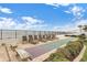 Community area features shuffleboard and lounge chairs overlooking the beach at 3747 S Atlantic Ave # 2050, Daytona Beach, FL 32118
