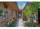 Welcoming entryway with potted plants and decorative elements leading to the front door at 396 Newton, Longwood, FL 32779