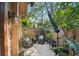 Cozy patio with comfortable seating, hanging plants, and privacy fence at 396 Newton, Longwood, FL 32779