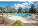 Beautiful community pool with plenty of seating and mature trees at 396 Newton, Longwood, FL 32779