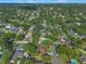 Wide aerial shot showcasing a neighborhood with tree-lined streets and well-maintained homes at 4011 Teriwood Ave, Orlando, FL 32812