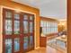 Inviting entryway with decorative double doors leading to a spacious living area at 4011 Teriwood Ave, Orlando, FL 32812