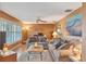 Bright living room with hardwood floors, plantation shutters, and comfortable seating at 4011 Teriwood Ave, Orlando, FL 32812