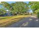 Exterior of the property showcasing a spacious playground area with swings and slides for outdoor Gathering fun at 4011 Teriwood Ave, Orlando, FL 32812