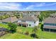 Sprawling home with fenced yard, patio, and a lush green lawn at 408 Egret Place Dr, Winter Garden, FL 34787