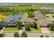 Gorgeous aerial view of a home with an appealing, manicured front lawn at 408 Egret Place Dr, Winter Garden, FL 34787