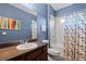 Cozy bathroom features a single sink vanity and a shower-tub combination at 408 Egret Place Dr, Winter Garden, FL 34787