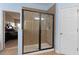 Bathroom featuring a tiled shower with glass door, and access to the main bedroom at 408 Egret Place Dr, Winter Garden, FL 34787