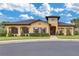 A well-maintained clubhouse with classic architecture and landscaping at 408 Egret Place Dr, Winter Garden, FL 34787