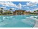 Resort-style community pool with a spacious pool deck and clear blue water at 408 Egret Place Dr, Winter Garden, FL 34787