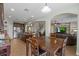 Well-equipped kitchen with stainless steel appliances, granite countertops, and island with barstool seating at 408 Egret Place Dr, Winter Garden, FL 34787