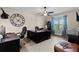 Bright office space with large desk, ample lighting, and views of the outdoors at 408 Egret Place Dr, Winter Garden, FL 34787