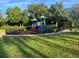 Fun community playground with colorful equipment and a safe, fenced-in area at 408 Egret Place Dr, Winter Garden, FL 34787