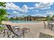 Relaxing pool area with comfortable lounge chairs and beautiful community views at 408 Egret Place Dr, Winter Garden, FL 34787