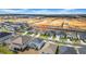 Drone's-eye view of the residence surrounded by houses, construction, and neighborhoods at 415 Overpool Ave, Davenport, FL 33896