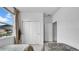 Comfortable bedroom with twin beds, a closet, and a bright window offering natural light at 415 Overpool Ave, Davenport, FL 33896