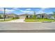 A cozy home featuring a manicured lawn and a neatly paved driveway at 415 Overpool Ave, Davenport, FL 33896