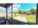 Inviting backyard showcasing a lush lawn and paver patio, perfect for outdoor activities at 449 Halter Dr, Apopka, FL 32712