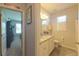 A shared bathroom featuring double sinks, granite countertops, and decorative lights at 449 Halter Dr, Apopka, FL 32712