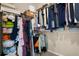 A walk in closet, full of many items and organizers at 449 Halter Dr, Apopka, FL 32712