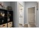 Hallway featuring shelving and decor that leads to the bathroom at 449 Halter Dr, Apopka, FL 32712