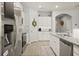 Well-appointed kitchen offers granite countertops, stainless steel appliances, and ample cabinet space at 449 Halter Dr, Apopka, FL 32712