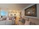 Open living and kitchen area with modern decor and ample natural light at 449 Halter Dr, Apopka, FL 32712