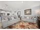 Spacious living room with neutral paint, area rug, featuring comfortable seating, with easy access to other rooms at 449 Halter Dr, Apopka, FL 32712