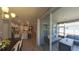 Open living space connecting the dining area, kitchen, and screen patio, creating a seamless flow at 449 Halter Dr, Apopka, FL 32712