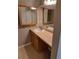 Bathroom featuring tiled floors, a vanity with mirror and ample lighting at 5005 Lindsay Ct, Orlando, FL 32821
