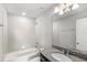 Bright bathroom with a tiled shower and a granite countertop vanity at 5006 Caspian St, St Cloud, FL 34771