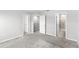Neutral bedroom with carpet and multiple doors for easy access to other rooms at 5006 Caspian St, St Cloud, FL 34771