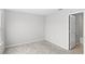 Neutral bedroom with carpet, window, and an ensuite bathroom at 5006 Caspian St, St Cloud, FL 34771